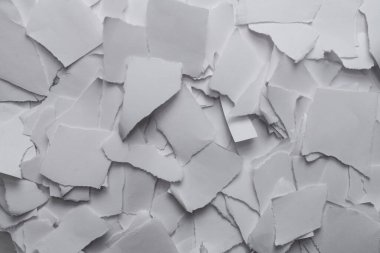 Arkaplan olarak boş beyaz kağıt parçaları. Metin veya tasarım için boşluk. 