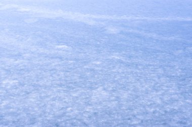 Buzun doğal dokusu, arka plan olarak donmuş göl..