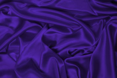 Zengin ve lüks kırmızı ipek kumaş dokusu. Üst görünüm.