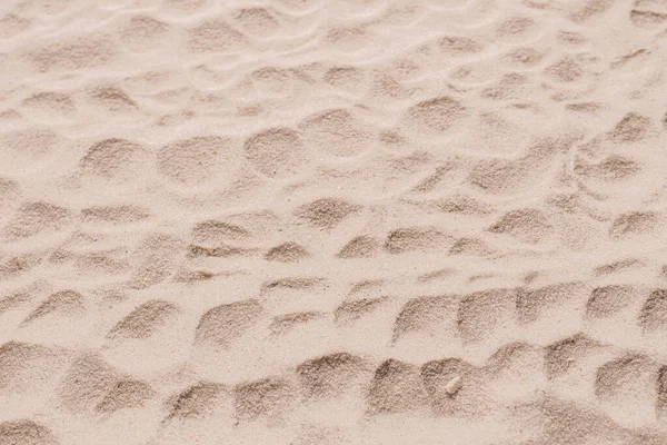Kum dokusu yakın çekim. Kum tepesi. Üst görünüm.