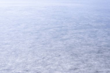 Buzun doğal dokusu, arka plan olarak donmuş göl..