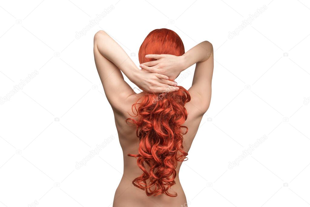 Woman backside, beautiful woman with red curly hair isolated on a white baackground. 