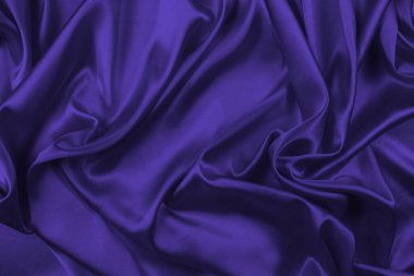 Zengin ve lüks kırmızı ipek kumaş dokusu. Üst görünüm.