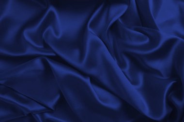 Zengin ve lüks kırmızı ipek kumaş dokusu. Üst görünüm.