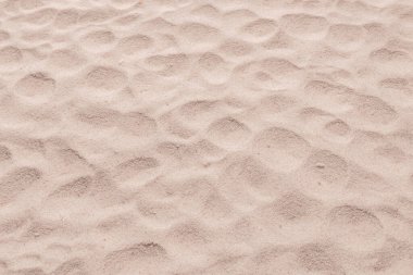 Kum dokusu yakın çekim. Kum tepesi. Üst görünüm.