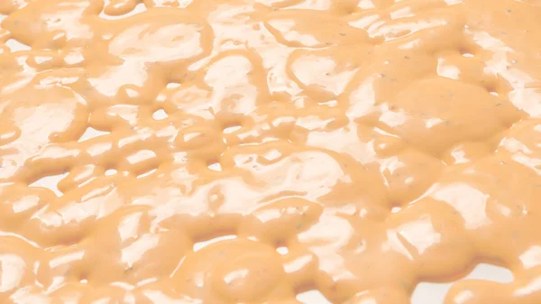 Whipped delicious sauce texture. Hamburger sauce background. Top view.