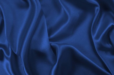 Zengin ve lüks kırmızı ipek kumaş dokusu. Üst görünüm.