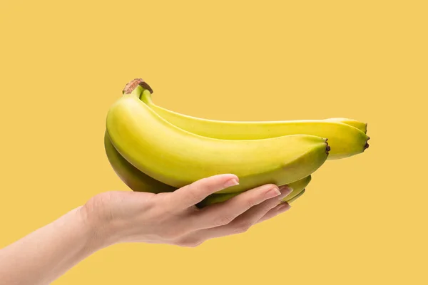 Bunch Bananas Woman Hand Isolated Yellow Background — ストック写真