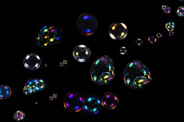 Sabun köpükleri siyah arka planda izole edilmiş. Boşluğu kopyala. 