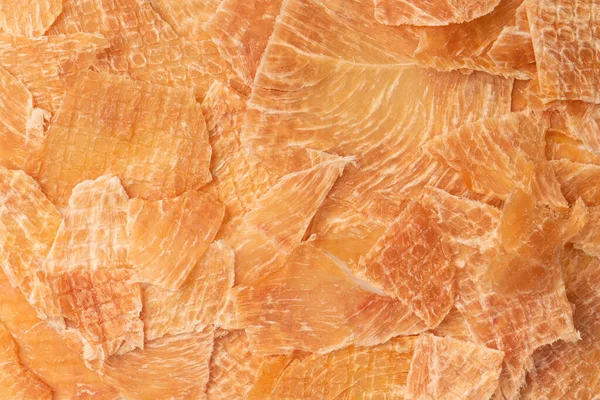 A group of tasty beer snacks. Dehydrated chicken meat slices. 