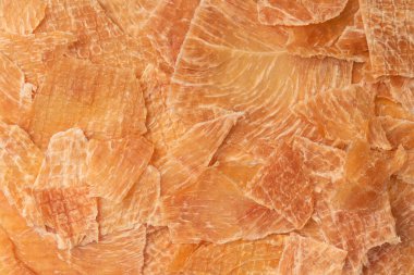 A group of tasty beer snacks. Dehydrated chicken meat slices. 