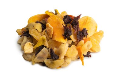 Kurutulmuş egzotik meyve, mango, ananas dilimleri, tutku meyvesi, papaya karışımı. Vejetaryen tatlı..  
