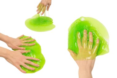 Beyaz arka planda yeşil sümüklü oyuncak..