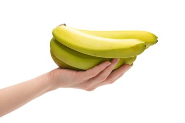 Beyaz bir arka planda, bir avuç muzu, bir kadının elinde soyutlamış..