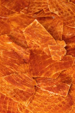 A group of tasty beer snacks. Dehydrated chicken meat slices. 