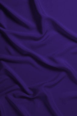 Zengin ve lüks kırmızı ipek kumaş dokusu. Üst görünüm.