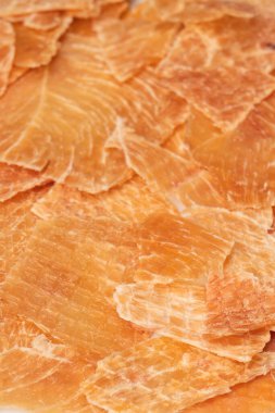 A group of tasty beer snacks. Dehydrated chicken meat slices. 