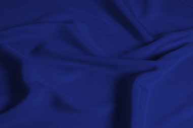 Zengin ve lüks kırmızı ipek kumaş dokusu. Üst görünüm.