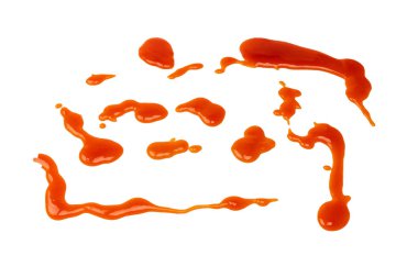 Arka planda izole edilmiş portakal sosu sıçraması. Üst görünüm. 