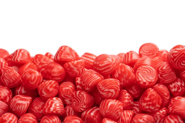 红色圆圆的美味的糖果 在白色的背景上呈伊斯兰状 — 图库照片