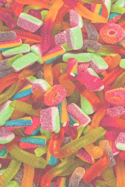 Geassorteerde Smakelijke Gummisnoepjes Bovenaanzicht Gelei Snoepjes Achtergrond — Stockfoto