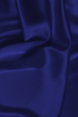 Zengin ve lüks kırmızı ipek kumaş dokusu. Üst görünüm.