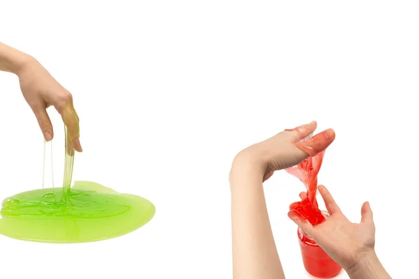 緑スライムおもちゃで女性手孤立上の白い背景 — ストック写真