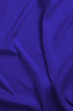 Zengin ve lüks kırmızı ipek kumaş dokusu. Üst görünüm.