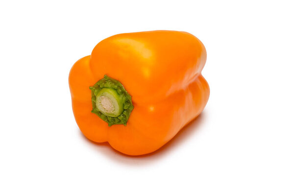 Orange bell pepper isolated on a white background. Top view.  Copy space.