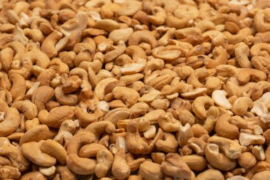 Lezzetli tuzlu fındık karışımı. Bir grup badem, fıstık, ceviz, macadamia, kaju..