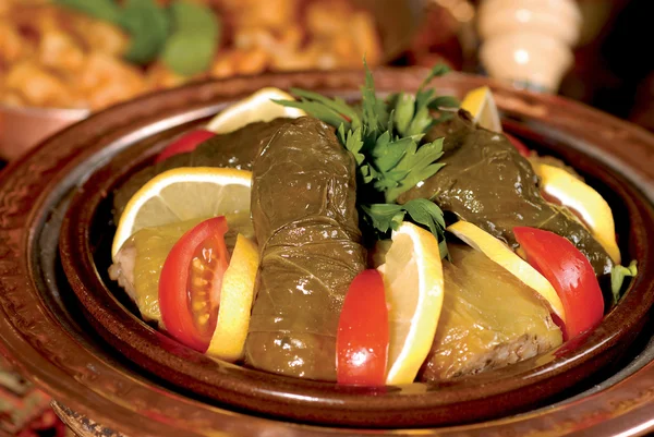 Stuffed grape leaves and cabbage rolls — Stock Photo, Image