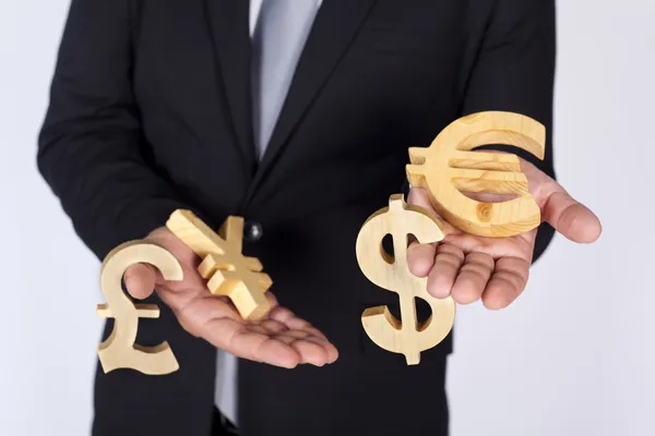 Businessman and world money icons — Stock Photo, Image