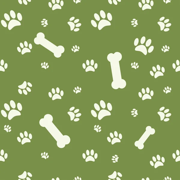 Hintergrund mit Hundepfote-Print und Knochen auf Grün — Stockvektor