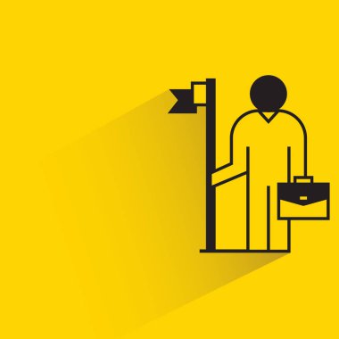 people with flag pole on yellow background