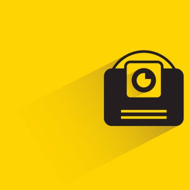 camera icon with shadow on yellow background