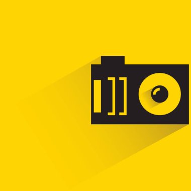 camera icon with shadow on yellow background