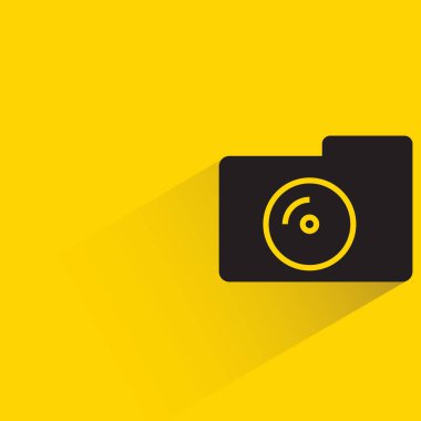 camera icon with shadow on yellow background