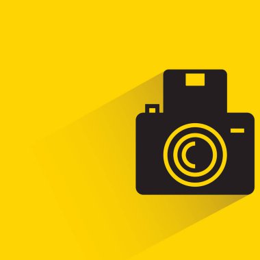 camera icon with shadow on yellow background