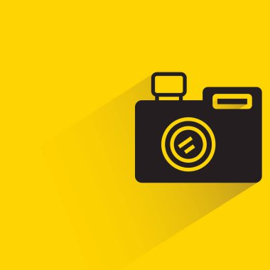 camera icon with shadow on yellow background
