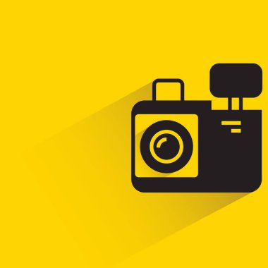 camera icon with shadow on yellow background