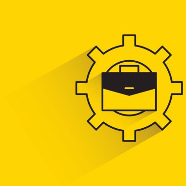 briefcase and gear with shadow on yellow background