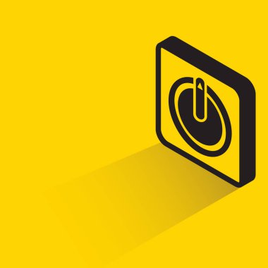 power button with shadow on yellow background