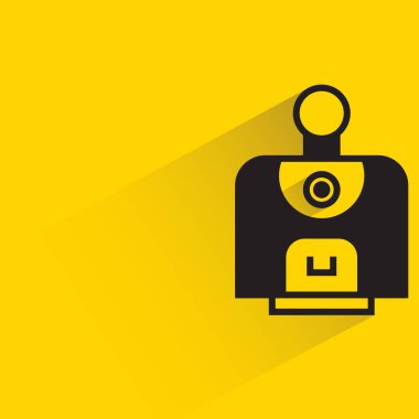 robot character with drop shadow on yellow background