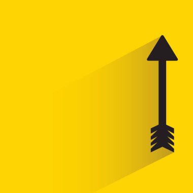 arrow with shadow on yellow background