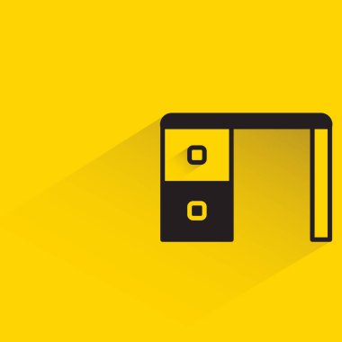 office table with shadow on yellow background