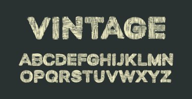 Kumaş harflerle VINTAGE harfleri ve eski bir tekstil dokusuyla İngiliz alfabesi. Esmer arkaplanda eski tarz büyük Latince harfler var. Yaratıcı kumaş yazı tipi tasarımı