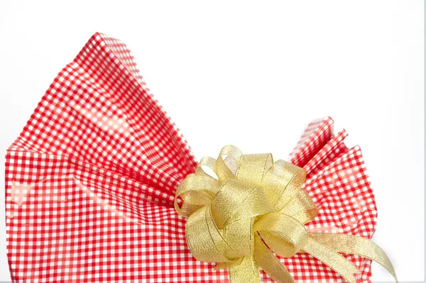 Single red gift box with silver ribbon on white background. — Stock Photo, Image