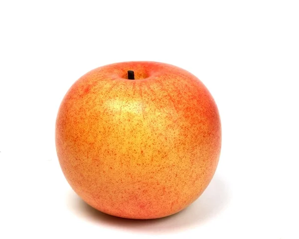 Оранжевое яблоко — стоковое фото
