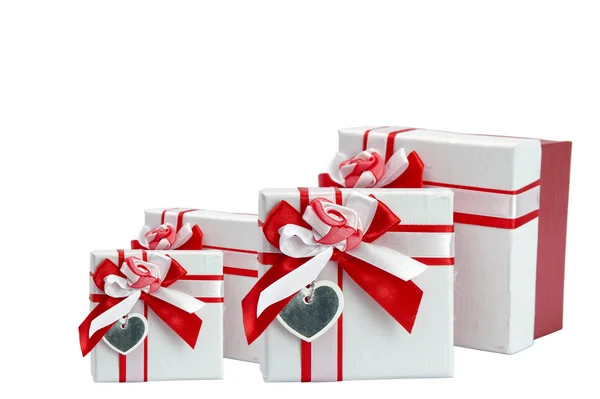 Single red gift box with silver ribbon on white background. — Stock Photo, Image