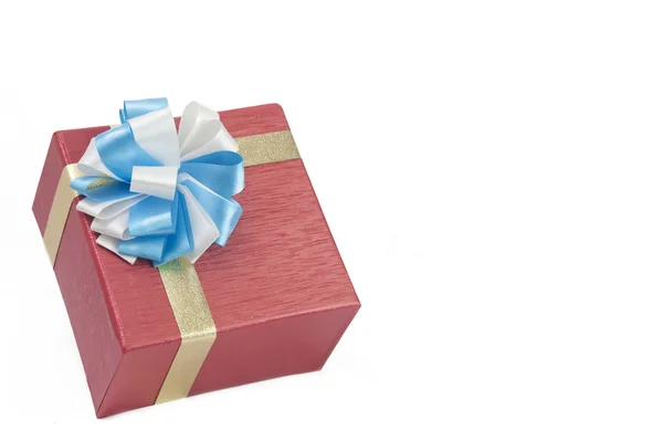 Single red gift box with silver ribbon on white background. — Stock Photo, Image